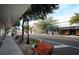 Street view with benches, bicycles and shops in a city district at 1402 Oleander Dr, Tarpon Springs, FL 34689