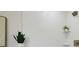Close-up shot of bathroom tile showing the contemporary textured design and neutral tones, providing a spa-like atmosphere at 1404 E Curtis St, Tampa, FL 33603