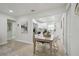 Open dining area features an adjacent kitchen and is illuminated by recessed lighting, offering a modern and inviting space at 1404 E Curtis St, Tampa, FL 33603