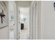 Hallway with views into the bathroom and bedroom providing a glimpse into the functional layout of the home at 1404 E Curtis St, Tampa, FL 33603