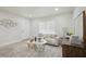 Cozy living room with neutral color palette and modern decor, featuring a bright, welcoming ambiance at 1404 E Curtis St, Tampa, FL 33603