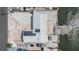 Waterfront property with dock and boat lift, showcasing the unique coastal living experience with solar panels at 1421 Sea Gull S Dr, St Petersburg, FL 33707