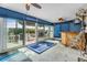 Bright bar area boasts sliding glass doors to a covered deck with views of the water at 1421 Sea Gull S Dr, St Petersburg, FL 33707