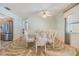 Light and bright dining room with large window, neutral colors, and an interesting floor at 1421 Sea Gull S Dr, St Petersburg, FL 33707