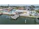Aerial view of waterfront house with private dock, with a boat lift and expansive waterfront access at 1421 Sea Gull S Dr, St Petersburg, FL 33707