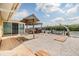 Exterior view of home featuring wood gazebo, deck with boat lift and views of the water at 1421 Sea Gull S Dr, St Petersburg, FL 33707