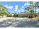 Exterior view of the Beckett Bay Club building with parking and landscaped grounds at 1472 Bay View St, Tarpon Springs, FL 34689