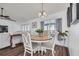 Cozy dining area with a round table, comfortable chairs, and natural lighting at 1472 Bay View St, Tarpon Springs, FL 34689