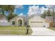 Charming single Gathering home with a well-manicured front yard at 1472 Bay View St, Tarpon Springs, FL 34689