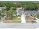 A nice aerial view of the property displaying its well-maintained lawn at 1472 Bay View St, Tarpon Springs, FL 34689