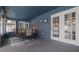 Enjoy the privacy of this enclosed lanai with a view of the backyard pool and patio area at 1472 Bay View St, Tarpon Springs, FL 34689