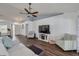 Inviting living room with comfortable seating, a ceiling fan, and a cozy atmosphere at 1472 Bay View St, Tarpon Springs, FL 34689