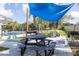 Outdoor picnic area with grills near the pool and playground at 1472 Bay View St, Tarpon Springs, FL 34689
