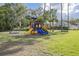 Colorful community playground equipment at 1472 Bay View St, Tarpon Springs, FL 34689