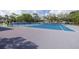 Community tennis court and basketball court at 1472 Bay View St, Tarpon Springs, FL 34689
