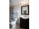 Well-organized bathroom features modern fixtures, vanity, and storage, creating functional yet elegant space at 1500 Ohio Ne Ave, St Petersburg, FL 33703