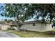 Charming single-story home featuring a well-maintained lawn and lovely curb appeal at 1500 Ohio Ne Ave, St Petersburg, FL 33703