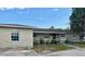 Well-maintained home with tidy front yard and driveway; charming and inviting at 1500 Ohio Ne Ave, St Petersburg, FL 33703