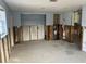 Renovation project showing an open kitchen layout undergoing remodeling, revealing studs and water heater at 1500 Ohio Ne Ave, St Petersburg, FL 33703