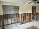 Open-concept living room undergoing renovation, showcasing potential for customization and modern design at 1500 Ohio Ne Ave, St Petersburg, FL 33703