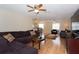 Relaxing living room with plenty of natural light, ceiling fan, and hardwood flooring at 1500 Ohio Ne Ave, St Petersburg, FL 33703