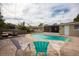 Inviting pool area with comfortable seating. A screened in porch and lush landscaping add to the backyard appeal at 1500 Ohio Ne Ave, St Petersburg, FL 33703