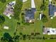 Beautiful home featuring RV parking, pool and a large, pristine green yard surrounded by a fence at 1521 Avondale Ridge Dr, Plant City, FL 33567