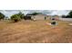 Expansive backyard view showcasing the perfect setting for outdoor activities and future landscaping at 1521 Avondale Ridge Dr, Plant City, FL 33567