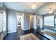 Bright bedroom with multiple closets and dark wood floors at 1521 Avondale Ridge Dr, Plant City, FL 33567