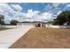 Well-maintained single-story home with a spacious three-car garage and inviting front yard at 1521 Avondale Ridge Dr, Plant City, FL 33567