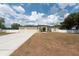 Well-maintained single-story home with a spacious three-car garage and inviting front yard at 1521 Avondale Ridge Dr, Plant City, FL 33567