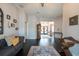 Spacious living room with dark hardwood floors, a decorative rug, and elegant furnishings at 1521 Avondale Ridge Dr, Plant City, FL 33567