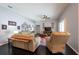 Cozy living room showcasing comfortable seating, stylish decor, and dark wood floors at 1521 Avondale Ridge Dr, Plant City, FL 33567