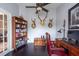 Inviting home office with dark wood floors at 1521 Avondale Ridge Dr, Plant City, FL 33567