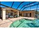 Beautiful, screened-in pool with ample seating and brick-paved patio for entertaining at 1521 Avondale Ridge Dr, Plant City, FL 33567