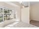 Sunny breakfast nook with a bay window, tile floor, and neutral walls for a light and welcoming feel at 1654 Portsmouth Lake Dr, Brandon, FL 33511