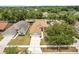 Up high aerial view showing the home and a well-maintained lawn at 1654 Portsmouth Lake Dr, Brandon, FL 33511