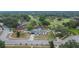 Aerial view of a home featuring well-kept landscaping and a long driveway at 2219 Summit View Dr, Valrico, FL 33596