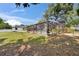 View of backyard pool and landscaping inside the screened enclosure at 2219 Summit View Dr, Valrico, FL 33596