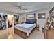 Bright bedroom with closet, ceiling fan, and furnishings at 2219 Summit View Dr, Valrico, FL 33596