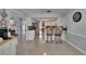Spacious kitchen featuring a breakfast bar, tile flooring, and easy access to other living spaces at 2219 Summit View Dr, Valrico, FL 33596
