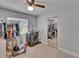 Laundry area featuring ample closet storage, tile flooring and front load washer and dryer at 2219 Summit View Dr, Valrico, FL 33596
