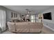 Open-concept living area with fireplace and large sectional sofa, creating a cozy and inviting space at 2219 Summit View Dr, Valrico, FL 33596