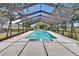 Backyard pool surrounded by a screened enclosure offering a private retreat at 2219 Summit View Dr, Valrico, FL 33596
