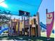 Community playground with pirate theme, shaded and featuring slides and climbing areas for to explore at 230 Medallion Blvd # G, Madeira Beach, FL 33708