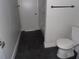 Renovated bathroom featuring modern tile, updated fixtures, and a comfortable layout at 2699 Seville Blvd # 802, Clearwater, FL 33764
