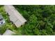 Aerial view showcasing the landscaping, parking area, and green space at 2913 Fig Ct, Palm Harbor, FL 34684