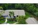 Aerial view of the building and landscaping, showcasing its exterior and setting at 2913 Fig Ct, Palm Harbor, FL 34684