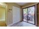 Living space with sliding glass doors leading to a patio and a large storage closet at 2913 Fig Ct, Palm Harbor, FL 34684