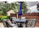 Cozy patio with cushioned seating, privacy fence, and a calming outdoor setting at 2913 Fig Ct, Palm Harbor, FL 34684